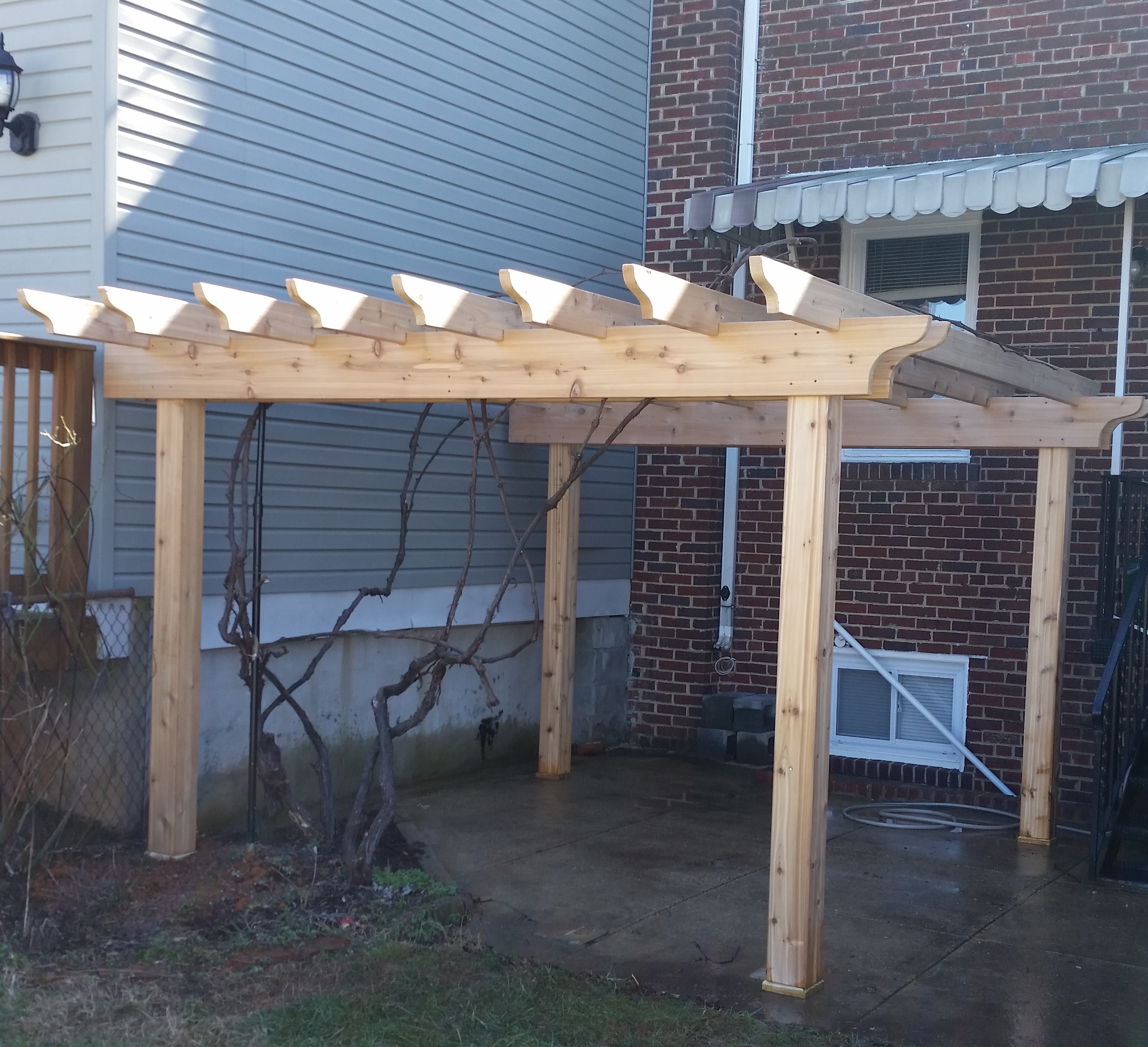 A Pergola over a Patio made with Pressure Treated Pine