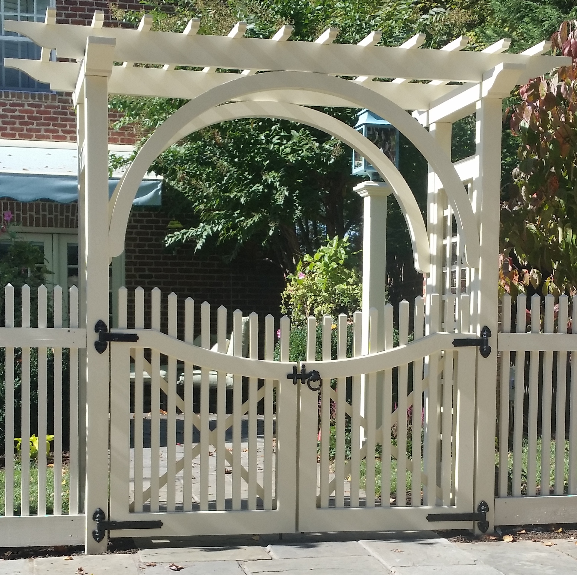 A Beautiful Arch and Arbor/Pergola over a 2x2 Picket Double Gate