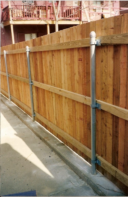 Attaching a Wood Fence to Steel Posts