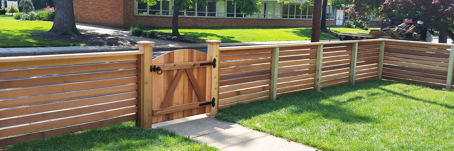 A Semi-Private Fence in Clear Western Red Cedar, with Cedar Flat Top Post Caps and a 2x4 Cap Board. 